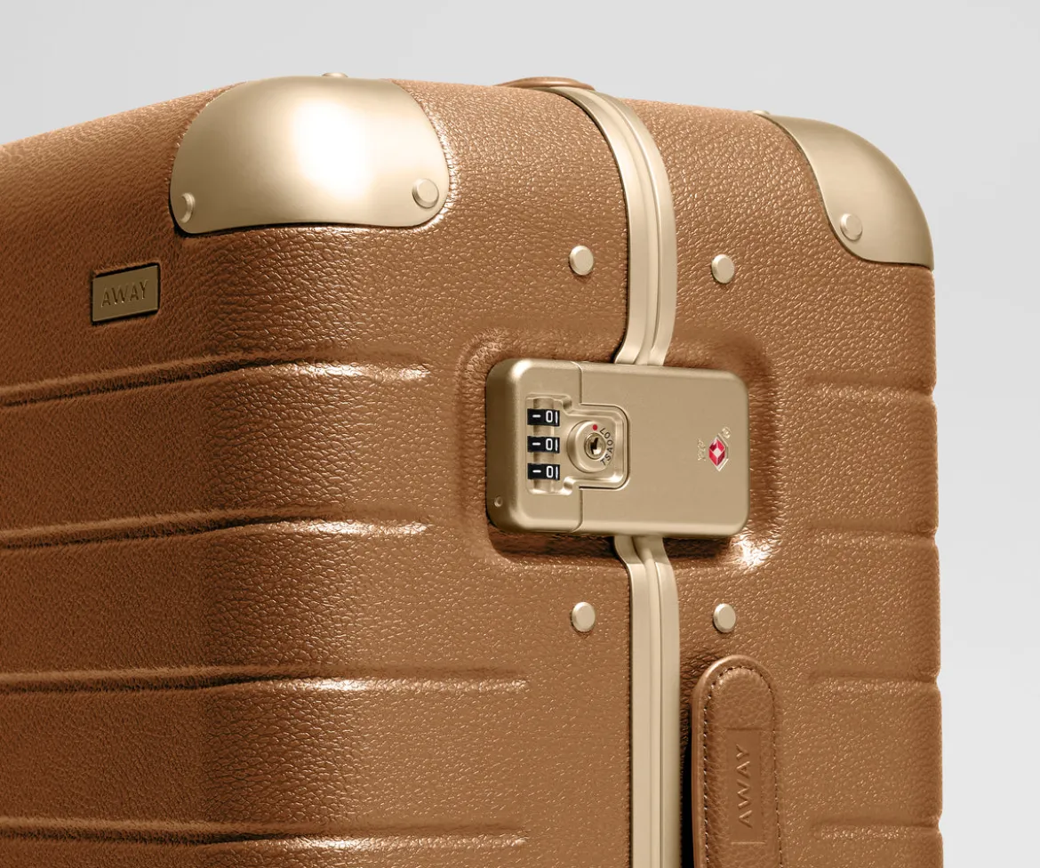 The Aluminum Edge Bigger Carry-On in Cognac Brown