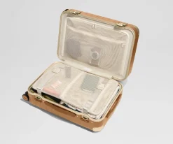 The Aluminum Edge Bigger Carry-On in Cognac Brown