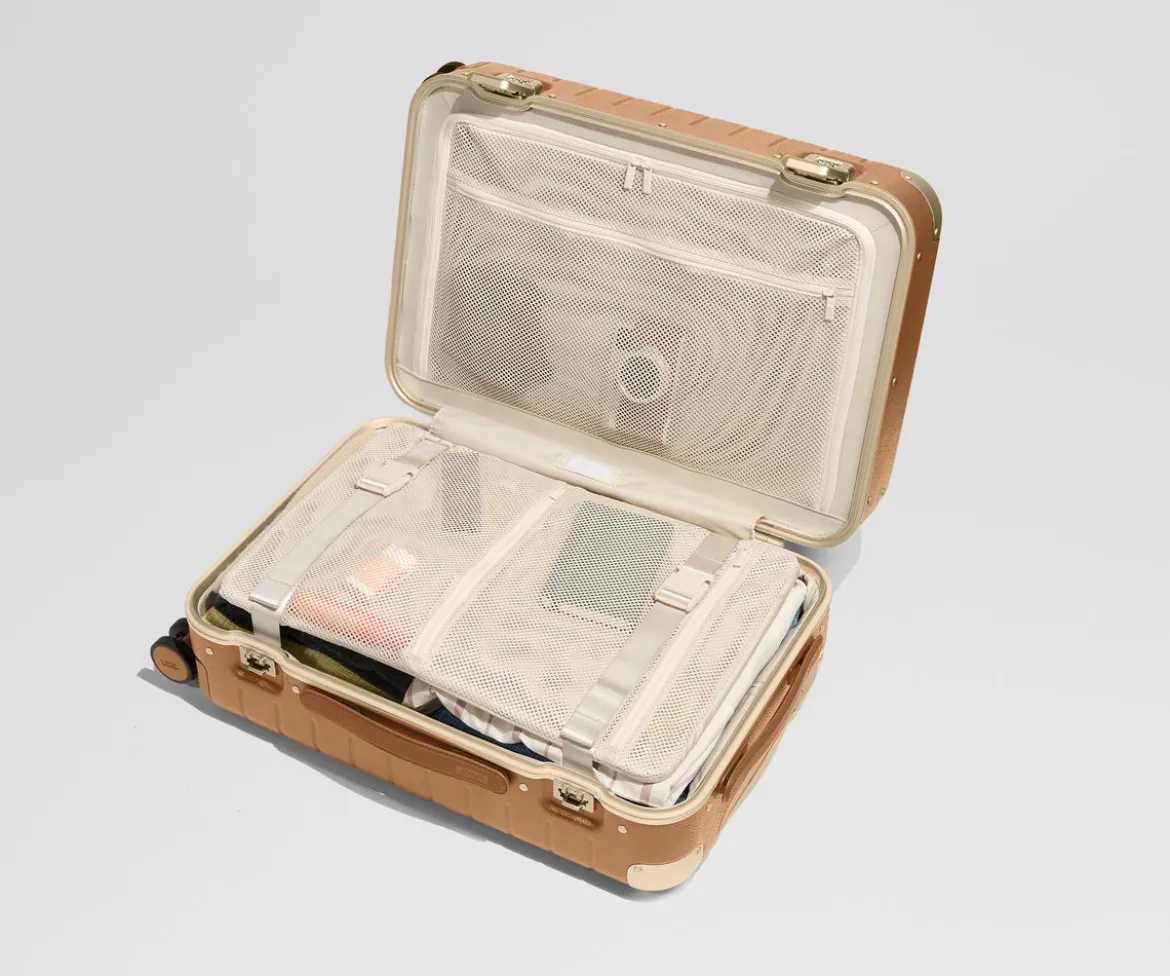 The Aluminum Edge Bigger Carry-On in Cognac Brown
