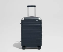 The Aluminum Edge Bigger Carry-On in Navy Blue