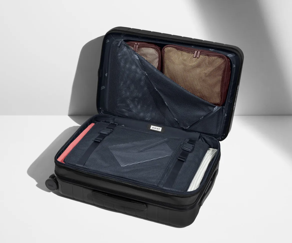 The Bigger Carry-On Flex in Navy Blue